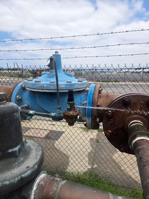 Large altitude control valve serviced at a municipal water facility