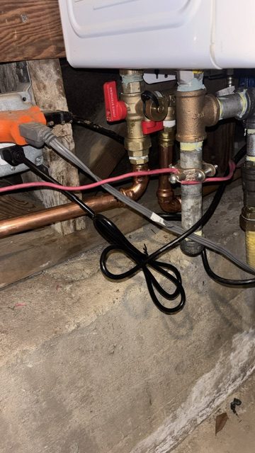 Tankless water heater installation with new copper supply connections